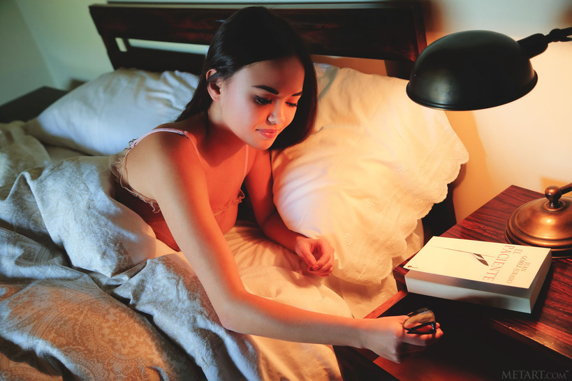 Petite, bespectacled beauty Li Moon reads a book in bed 02