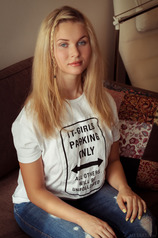 Tight blue jeans, white T-shirt, long blonde hair, blue eyes and big, round breasts - Caroline Abel